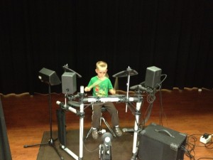 Ethan on drums